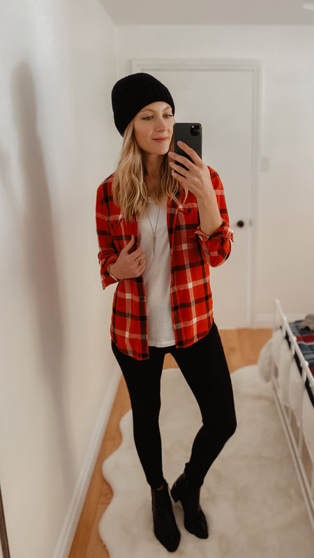 How to wear a plaid shirt - layered over a white t-shirt.