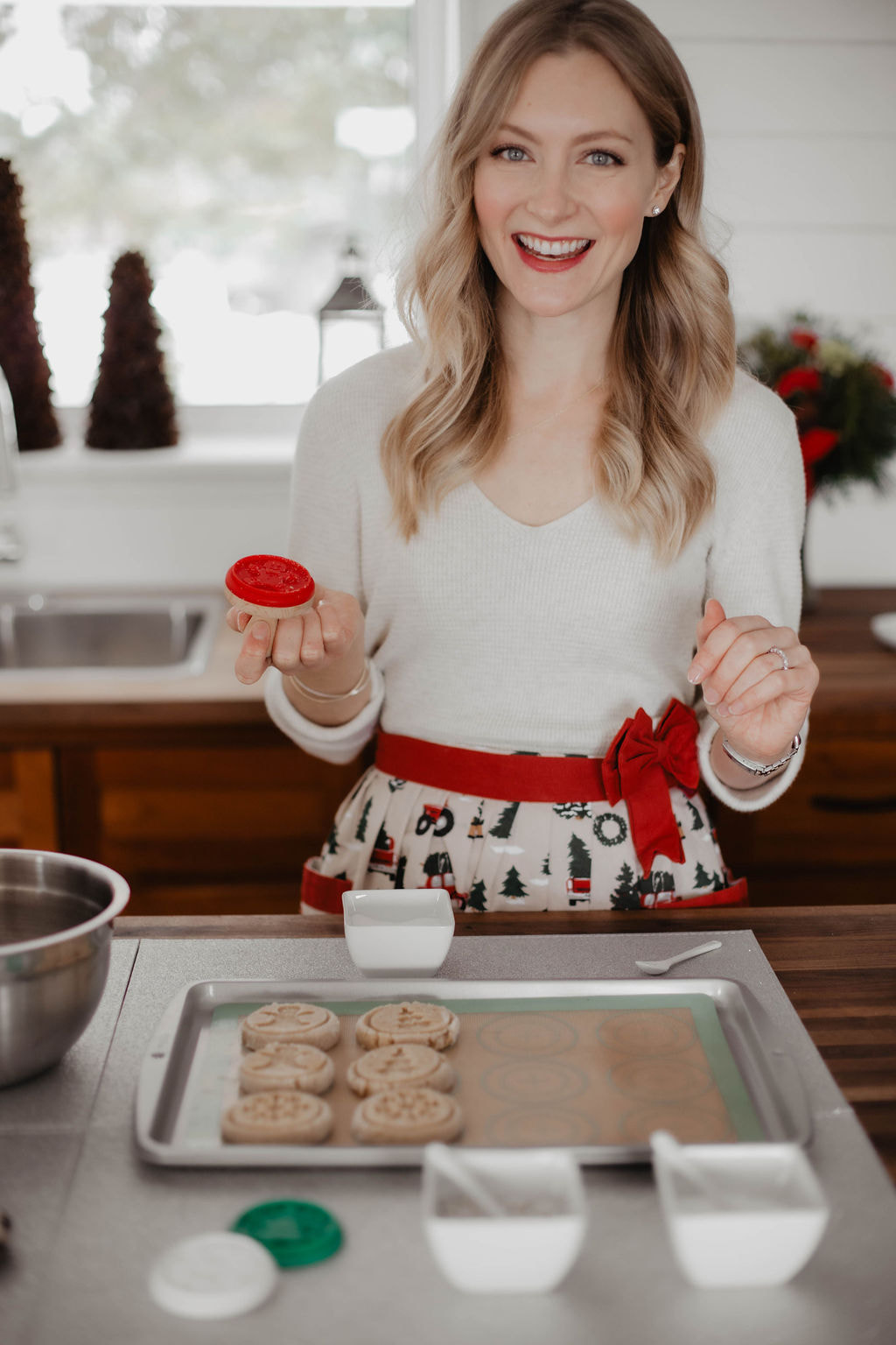 Baking Christmas Cookies Using A Cookie Stamp